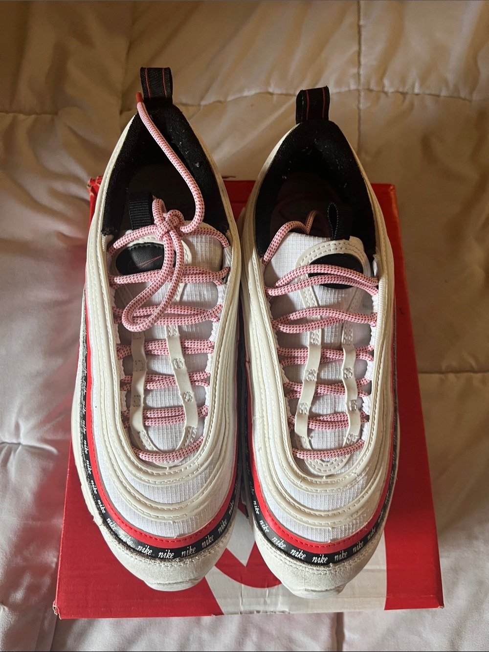 Nike Women’s White Sneakers with Pink Accents and Black Trim